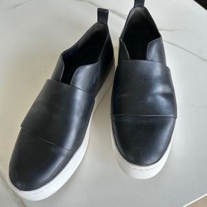 Vince black platform slip-on shoes